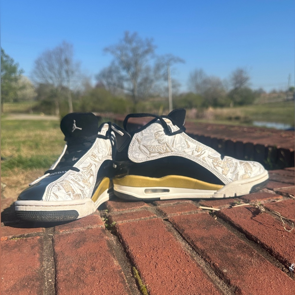 Black and gold jordans